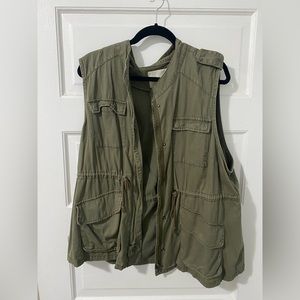 Green military style sleeveless jacket